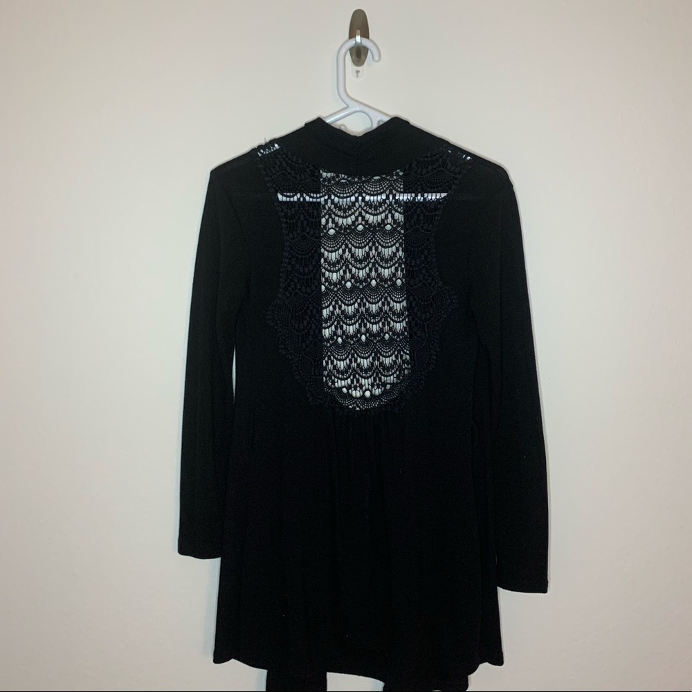 Crochet back cardigan.
